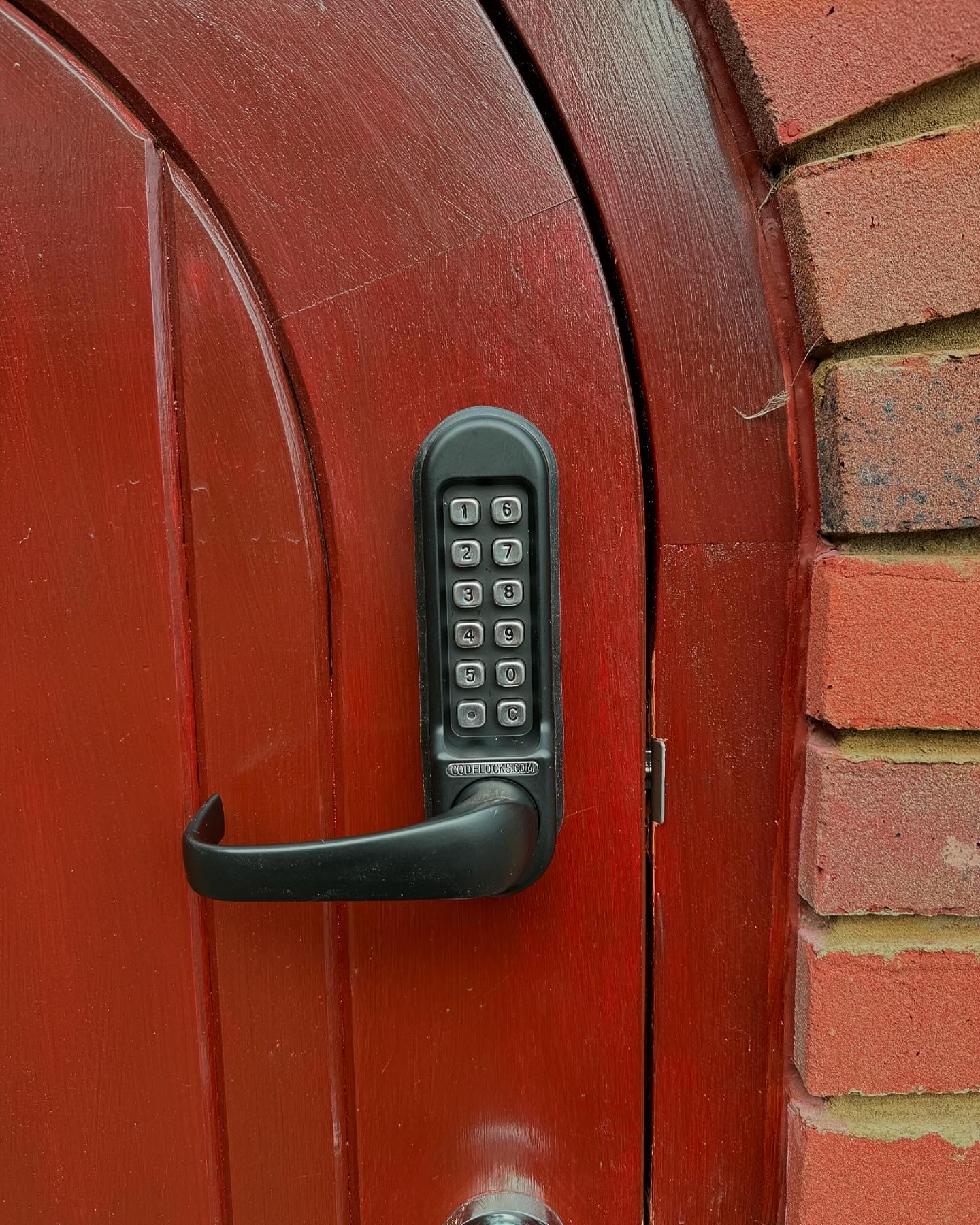 Completed weatherproof keypad lock installation on side garden entrance in Northolt UB5